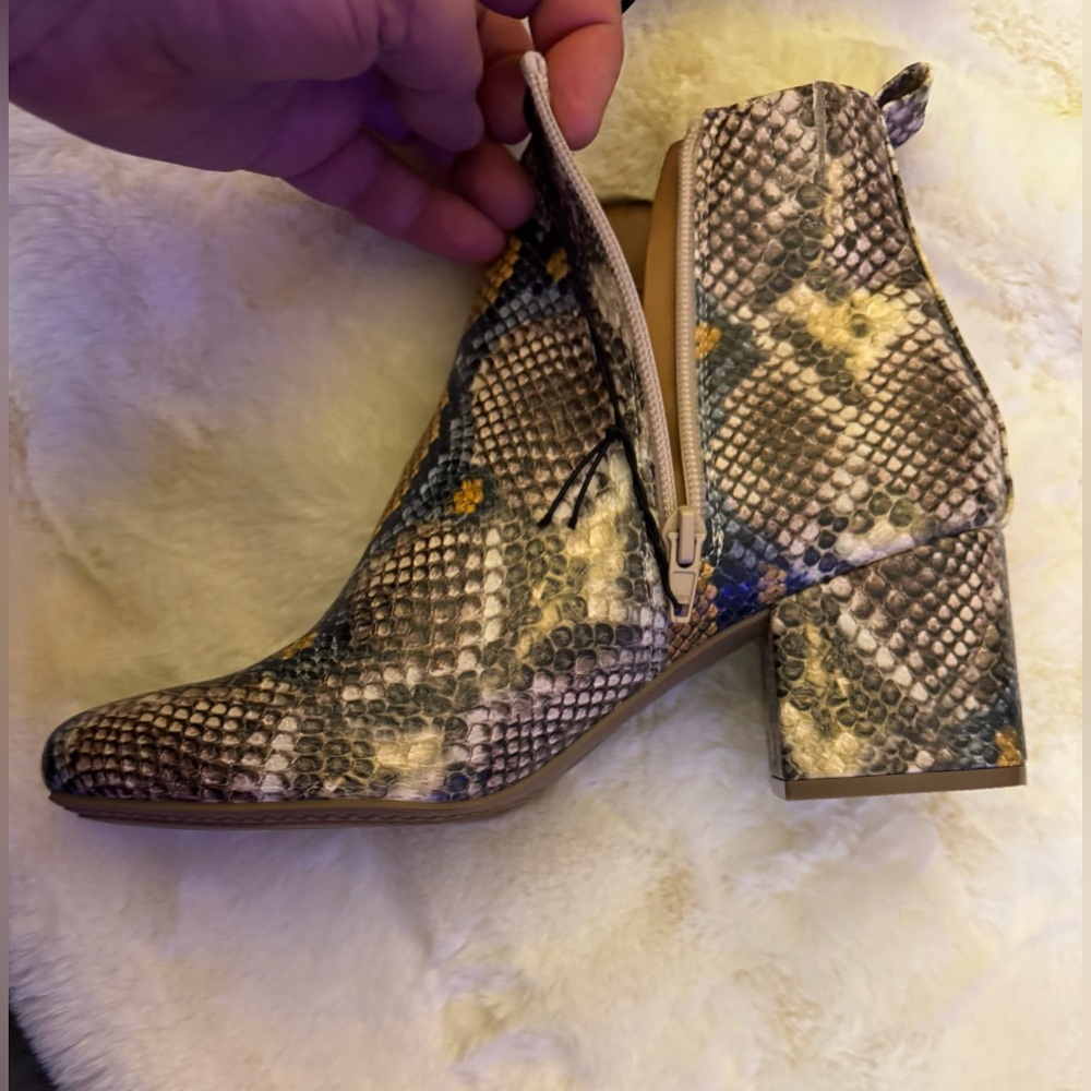 Brand new  with tags .Women Snake Print Ankle Boots